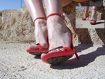 Loosening In Crimson Sandals High Heels Sitting In The Sun