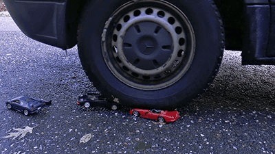 Metal Cars Shred Under Strong Tires