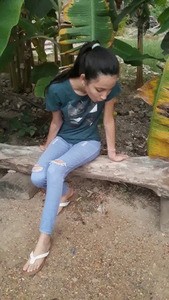 Latina Woman Hocking Loogies On The Ground